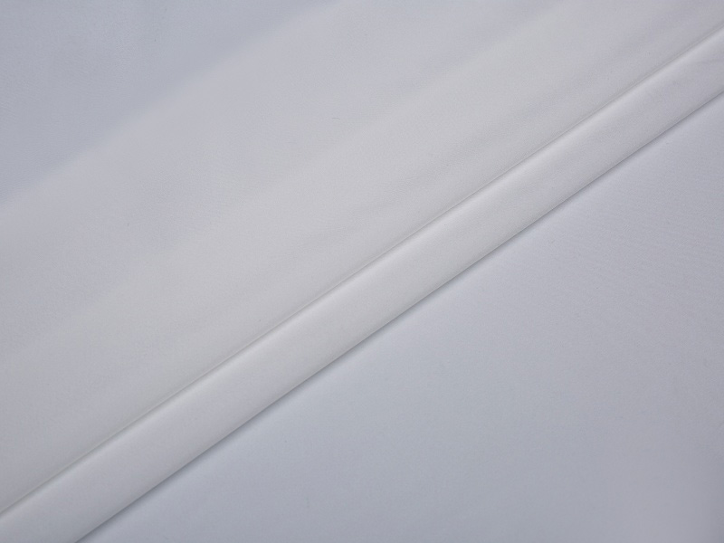 Polyesterová strečová podšívka