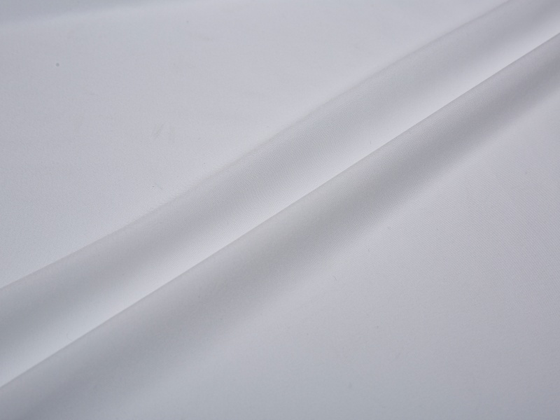 Polyesterová strečová podšívka